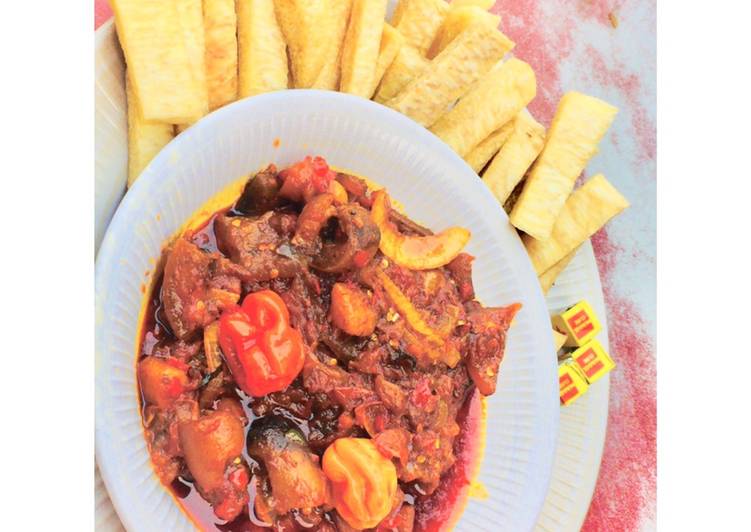 Fried yam and kpamo stew