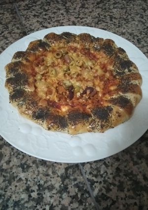 صورة لوصفة فطيرة على شكل بيتزا