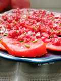Carpaccio de tomate con tartar de salami