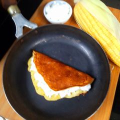 A picture of Cachapas - Venezuelan Corn pancakes.