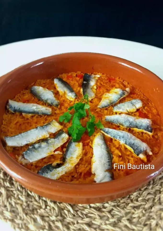 Una foto de Arroz con sardinas