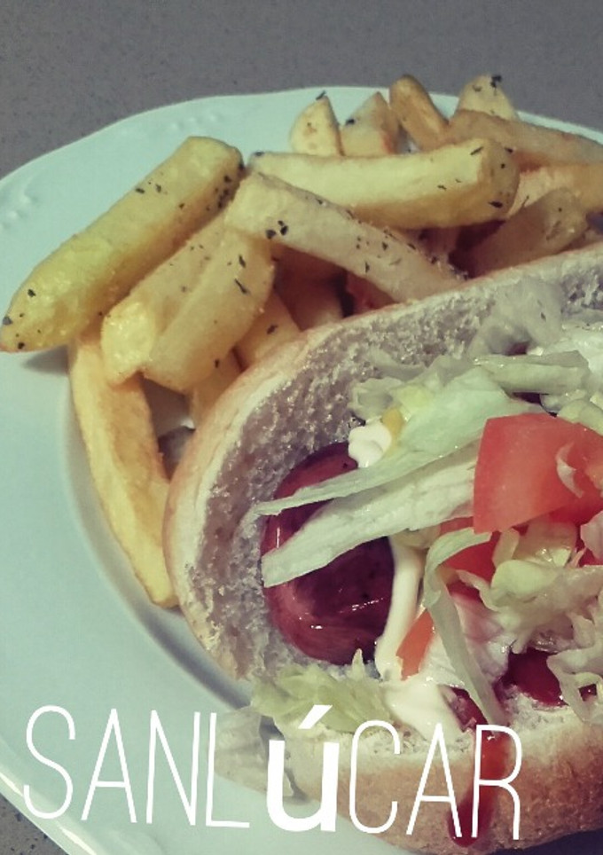 Una foto de Hot dog con queso y panceta