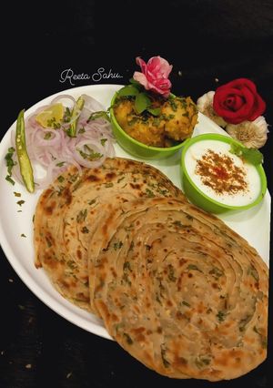 A picture of Laccha Paratha with Aloo Sabzi.