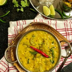 A picture of Lau diye Bhaja Muger Dal (Split Green Gram & Bottle Gourd Curry - Bengali style).