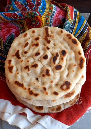 A picture of Homemade naan. Without oven.