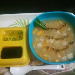 A picture of Masala paneer corn soup.