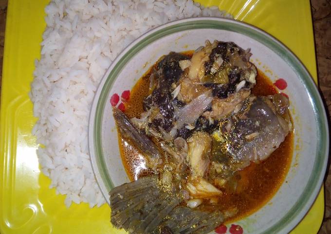 White rice and yellow stew with fresh fish
