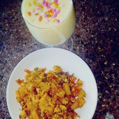 A picture of Egg fried potatoes with sweet potato smoothie.