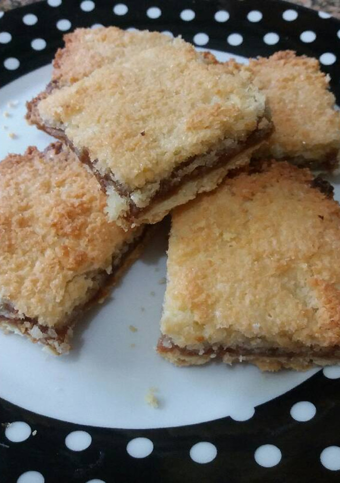 Una foto de Torta de dulce de leche y coco