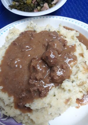 A picture of Riced Potatoes and Meatball Gravy.