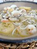Patatas con gambas, almejas y gulas