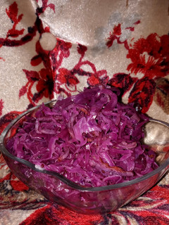 Una foto de Col agridulce con tocino