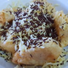 A picture of Fried Banana With Cheese and Chocolate Sprinkle.