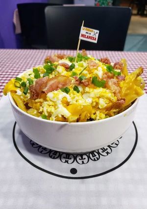 Una foto de Papas cheddar