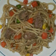 A picture of Sausage and bacon pasta.