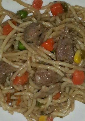 A picture of Sausage and bacon pasta.