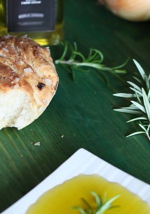 A picture of Bread with Olive Oil.