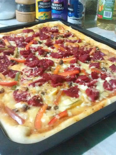 Una foto de Pizza puré y chorizos