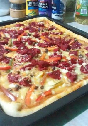 Una foto de Pizza puré y chorizos