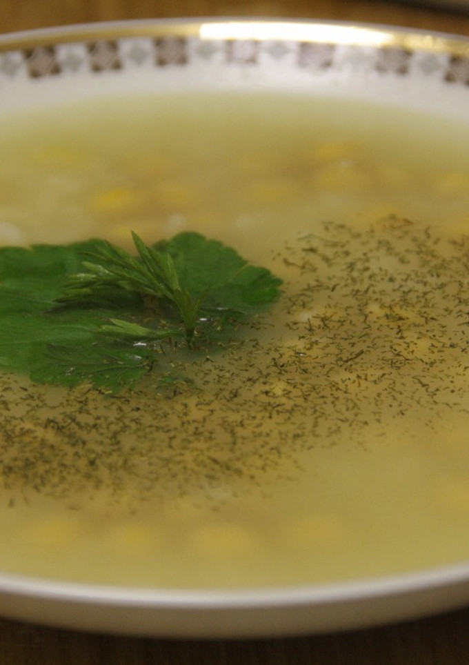 Una foto de Sopa vegetal de arroz con garbanzos. (Vegano)