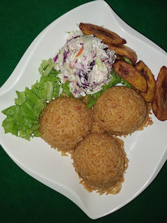 A picture of Jollof rice and Plantain.