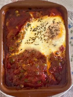 Una foto de 594. Huevos a la flamenca con patatitas (principal carne)