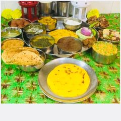A picture of #Punjabi Thali..Sarson Ka Saag, Makki Ki Roti,Punjabi ChanaDal,Kale ChanaCurry Turnip,.