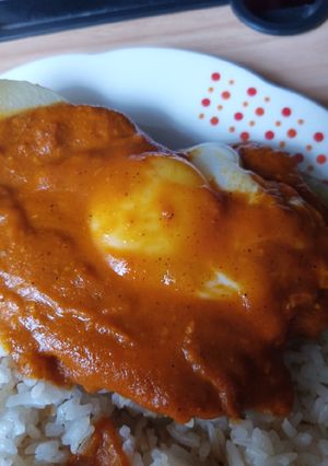 Una foto de Huevo entomatado
