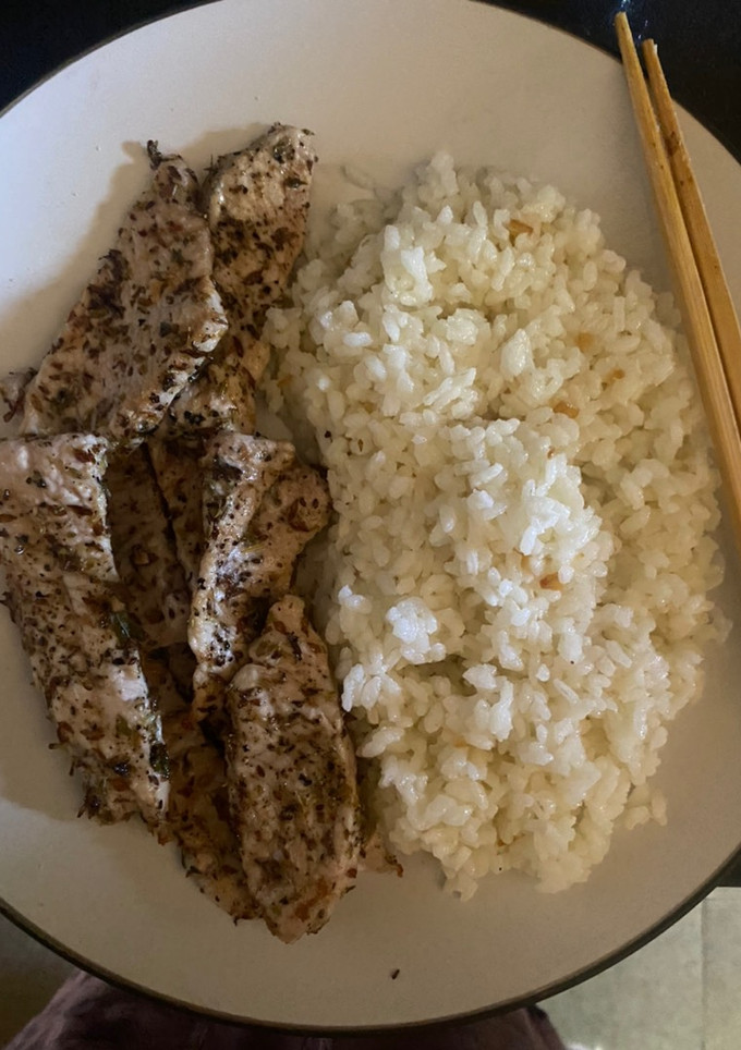 Una foto de Lomo con arroz
