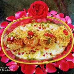 A picture of Bread dahi vada.