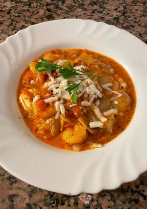 Una foto de Saganaki de Camarones