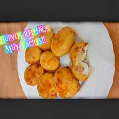Una foto de Huevos rellenos rebozados