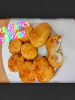 Una foto de Huevos rellenos rebozados