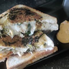 Cheese spread spring onion potato sandwich A picture of Cheese spread spring onion potato sandwich.