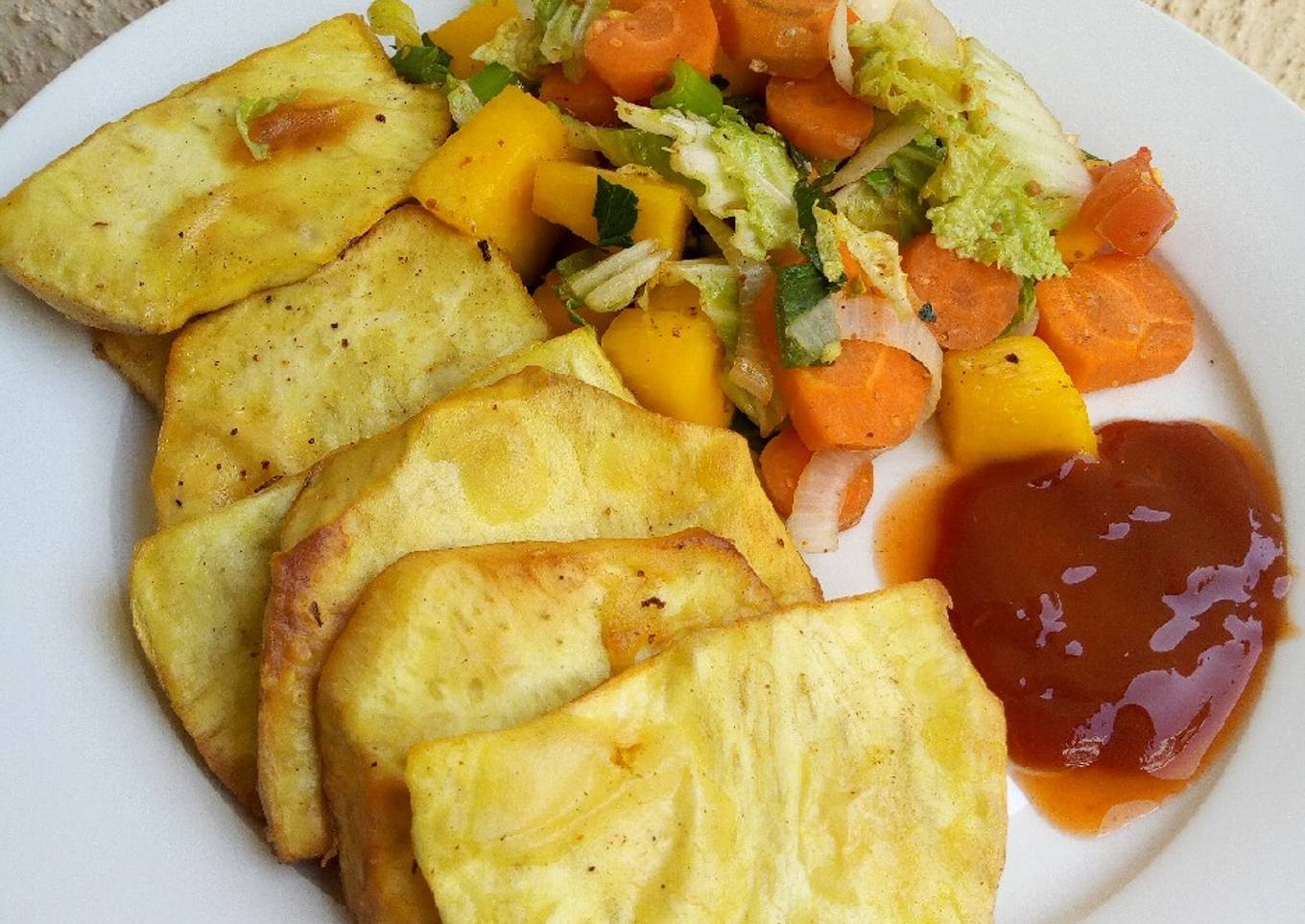 Fried sweet potatoes with steamed veggies