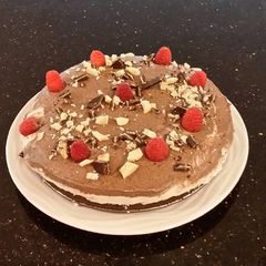 A picture of White Chocolate Mint Cream Torte with Chocolate Cream Topping.