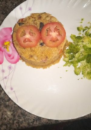 A picture of Couscous jallof.
