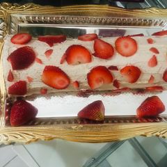 A picture of Lotus biscoff strawberry Swiss roll cake.