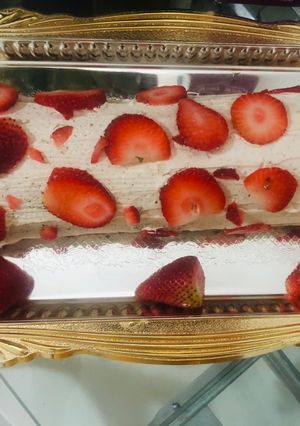 A picture of Lotus biscoff strawberry Swiss roll cake.