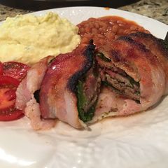 A picture of Bacon Wrapped Stuffed Cream Cheese Beef Poblano Pepper.