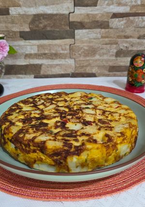 Una foto de Tortilla de papas y hongos