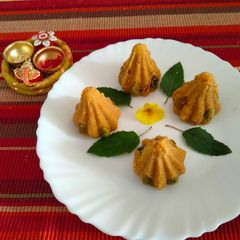 A picture of Besan almond and pistachio Modak.