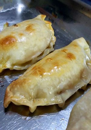 Una foto de Empanadas de queso y cebolla