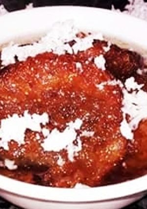 A picture of Chhena Malpua dipped with sugar syrup.