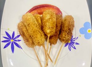 Una foto de Corn Dogs coreanos (panchos rebozados)