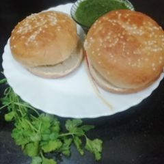 A picture of Crispie Poha Potato Tikki Burger.