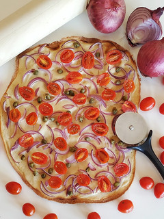 Una foto de Flammkuchen (pizza italiana)