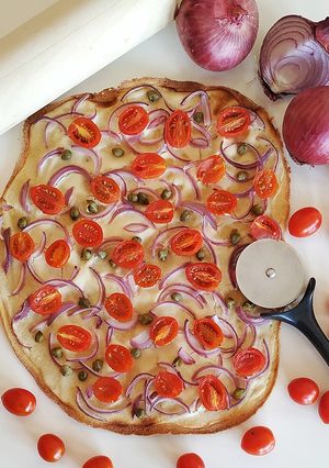Una foto de Flammkuchen (pizza italiana)