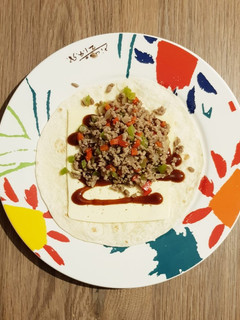 Una foto de Burritos de carne y pollo