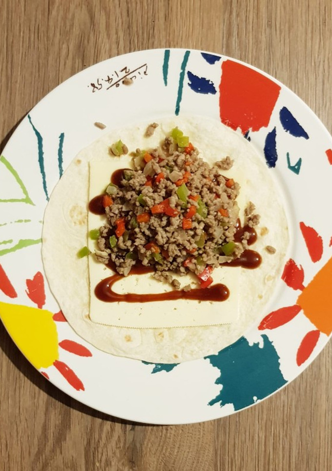 Una foto de Burritos de carne y pollo